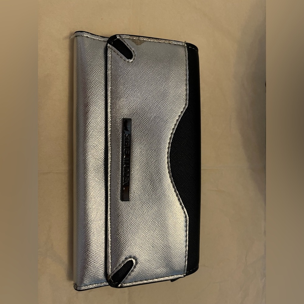 Steve Madden Black and Silver Wallet with Elegant Wave Design